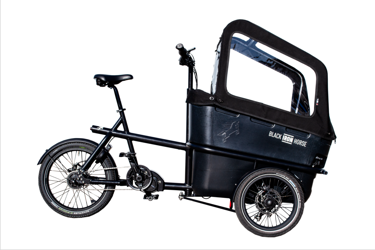 Side_IBEXCOVER_white_bg-1500x1000 - mycargobike köln GmbH Black cargo bike with a large enclosed passenger box labeled Black Iron Horse against a white background