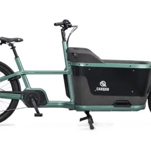 Green electric cargo bike with a large black front cargo box, on a white background, brand CARQON visible on the side.
