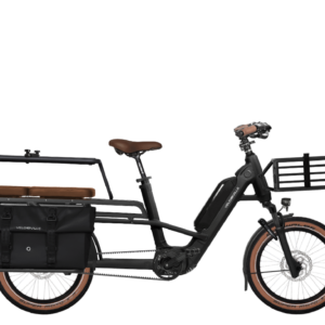 Black electric cargo bike with front basket, rear pannier bags, and brown saddle; designed for carrying cargo on a long-tail frame.